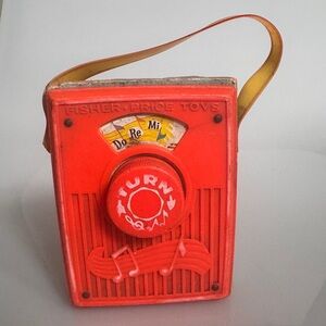 Vintage 1969 Fisher-Price Red Pocket Radio Music Box collectible mid century
